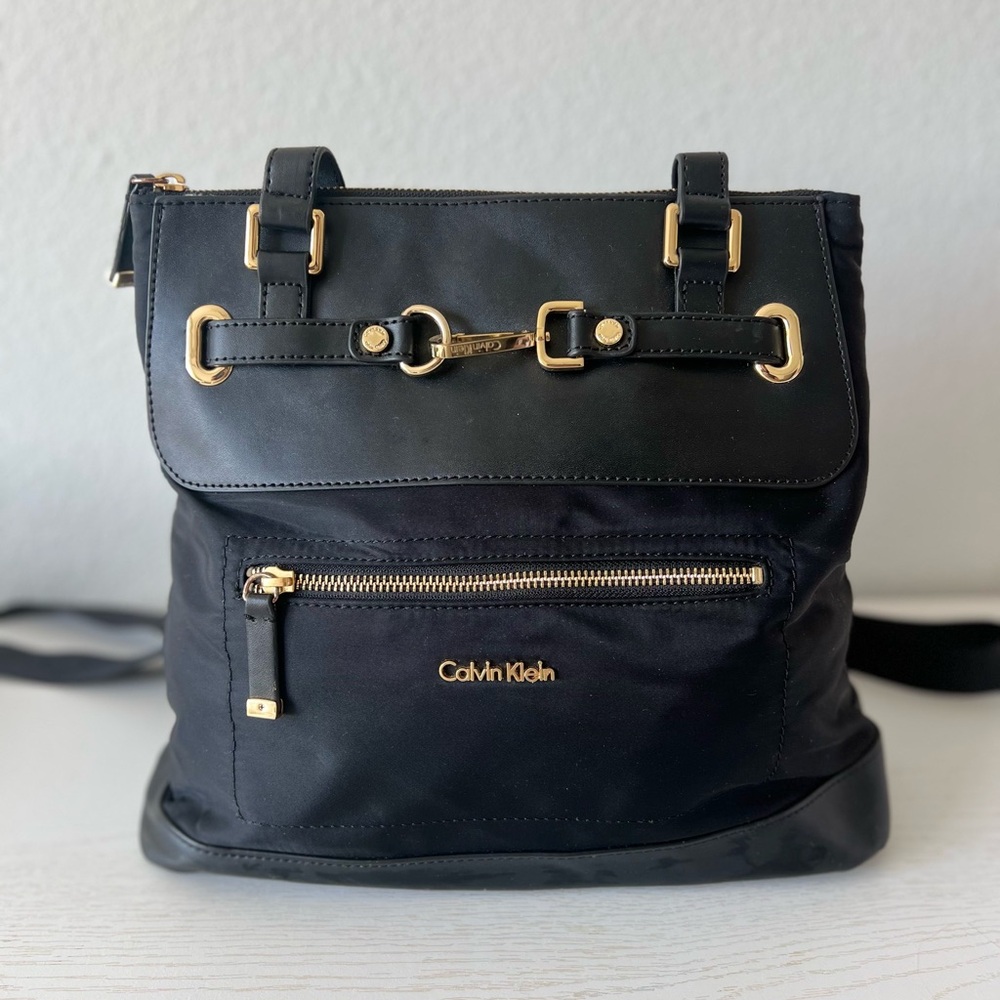 Vintage Calvin Klein Black Backpack with Gold Accents